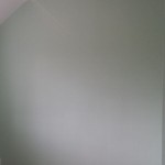 Bedroom walls after applying 2 coats of paint.