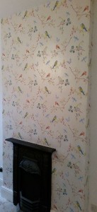 Post wallpapered wall.