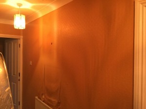 Prior to wallpapering.