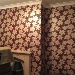 Living room walls before applying wallpaper.