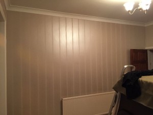 Living room walls before applying wallpaper.