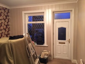 Living room walls before applying wallpaper.