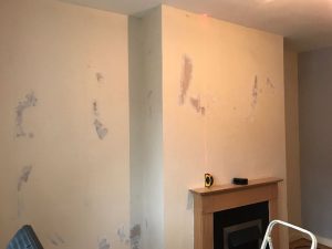 Before the wall was wallpapered.
