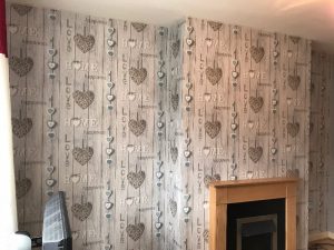 Finished wall that was wallpapered.