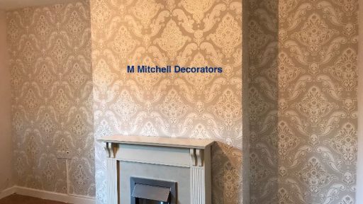 Living room feature wall after applying wallpaper.