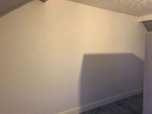 Preparing the wall.